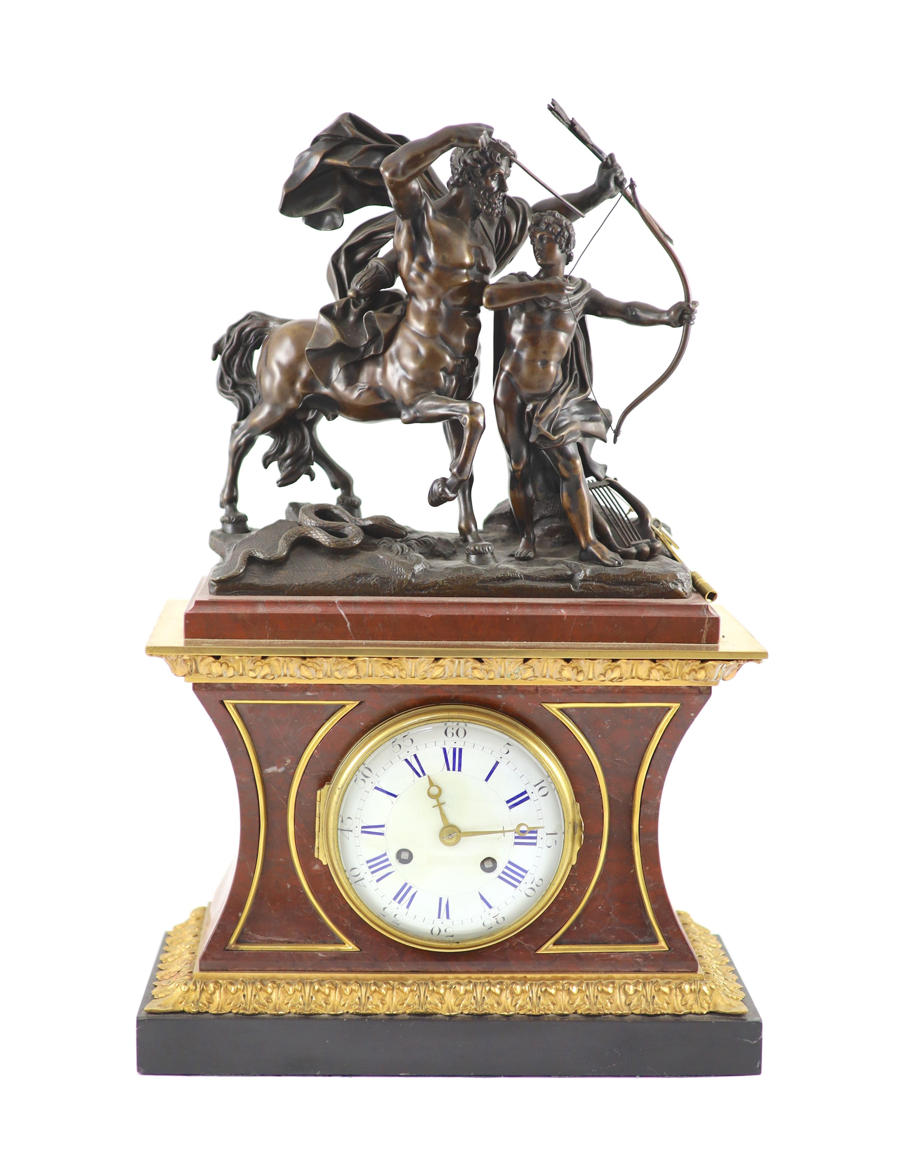 A late 19th century French bronze mounted rouge marble mantel clock, H 53cm. W 34cm.
